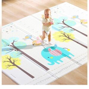 Baby Play Mat. Padded, 
Reversible, Foldable, Brand New In Bag
79long by 56 tall